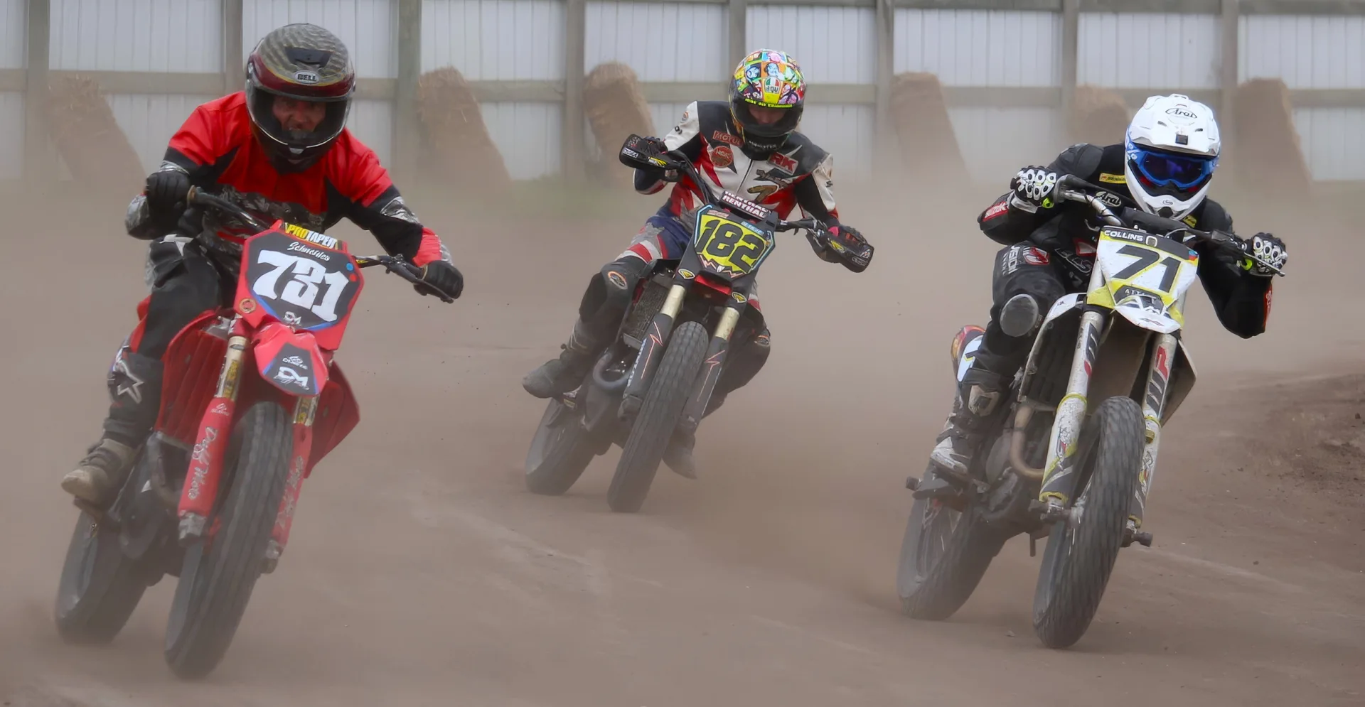 Alberta flat track motorcycle racers competing on a dirt oval