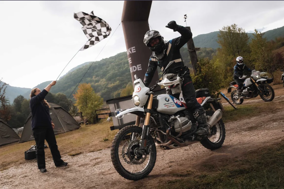BMW GS Trophy 2026 participants posing with awards after the Romania event.