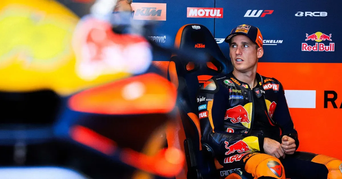 Pol Espargaro seated in the Red Bull KTM Tech3 garage