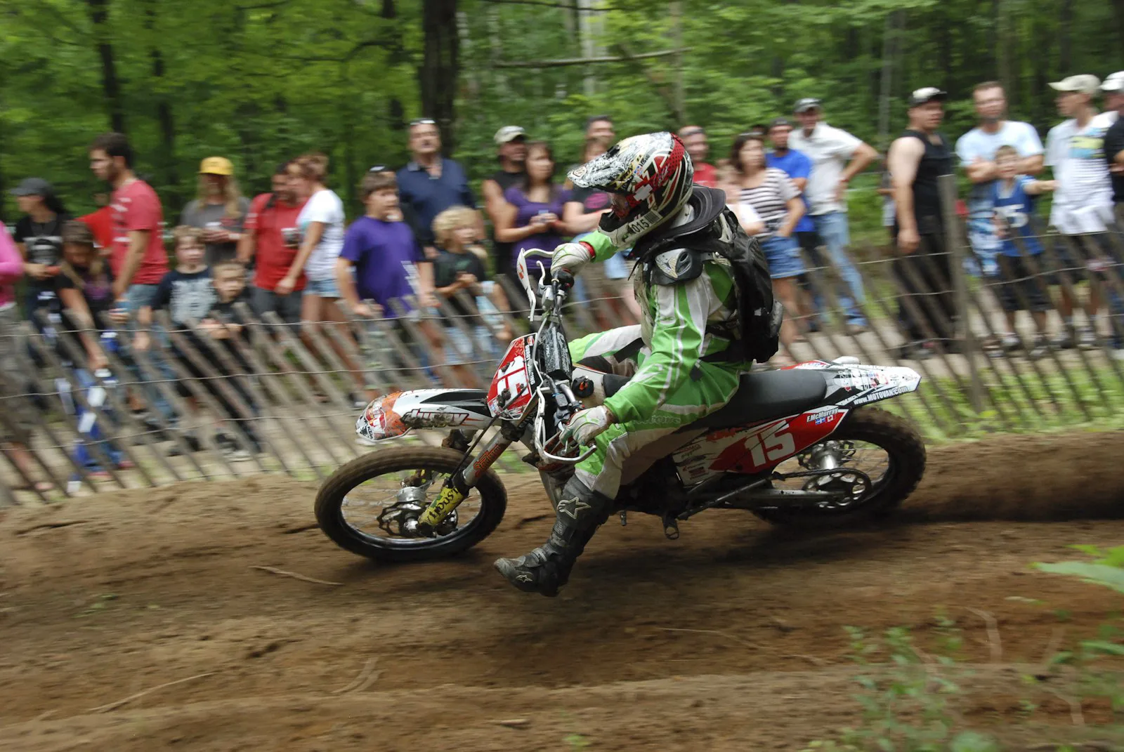 Enduro motorcycle racer during a timed off-road section in Ontario.