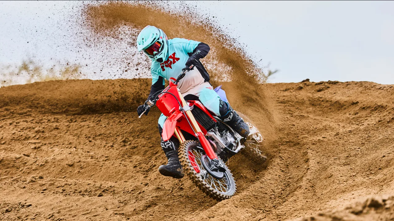2027 Honda CRF450 competition motorcycle shown in profile