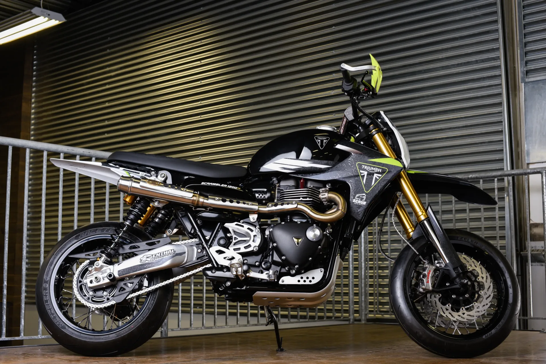 Motos Illimitées' custom Triumph Scrambler 1200 XE built as a big-displacement supermoto for Triumph Originals 2026.