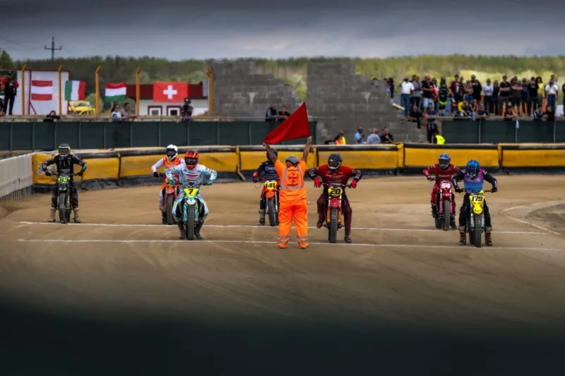 Riders line up at the 2026 FIM Flat Track World Championship round in Vasad, Hungary.