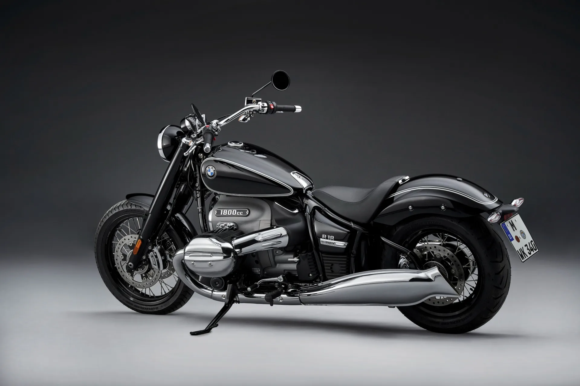 Original-generation BMW R 18 cruiser in a rear three-quarter studio view