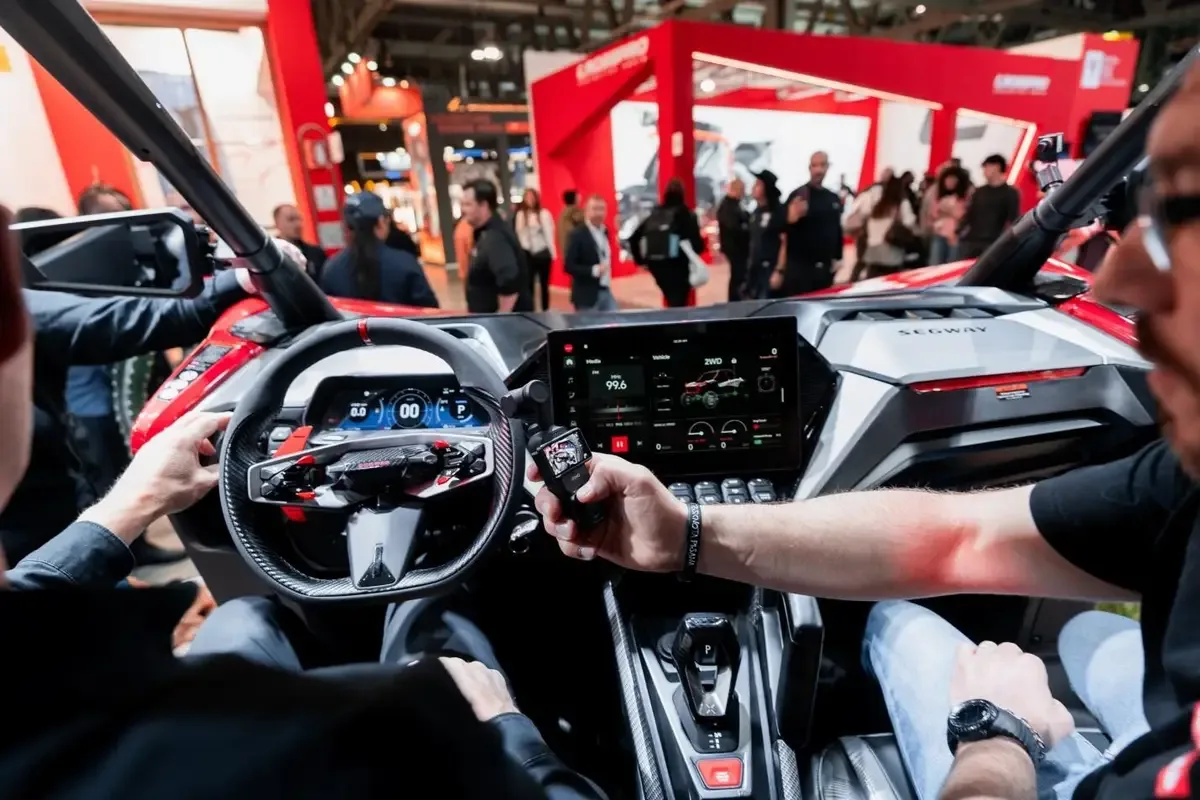 Segway off-road vehicle cockpit and connected display at EICMA 2025, used as iFUN technology context
