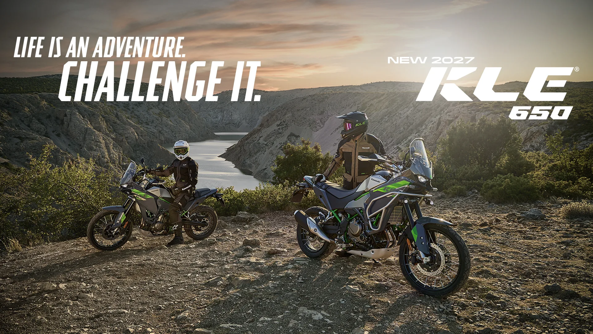 Kawasaki KLE650 motorcycles outdoors in a promotional image with Life Is an Adventure lettering.