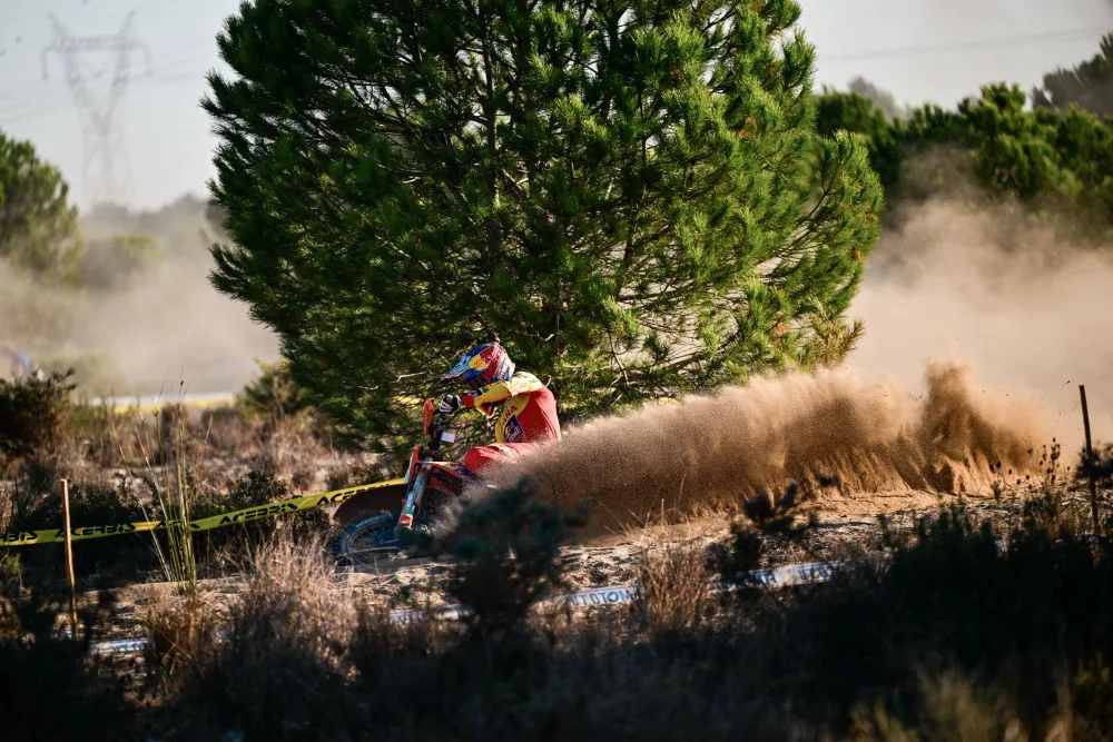 Enduro riders race through sandy conditions during Day Five of the 2026 FIM 6DAYS in Portugal