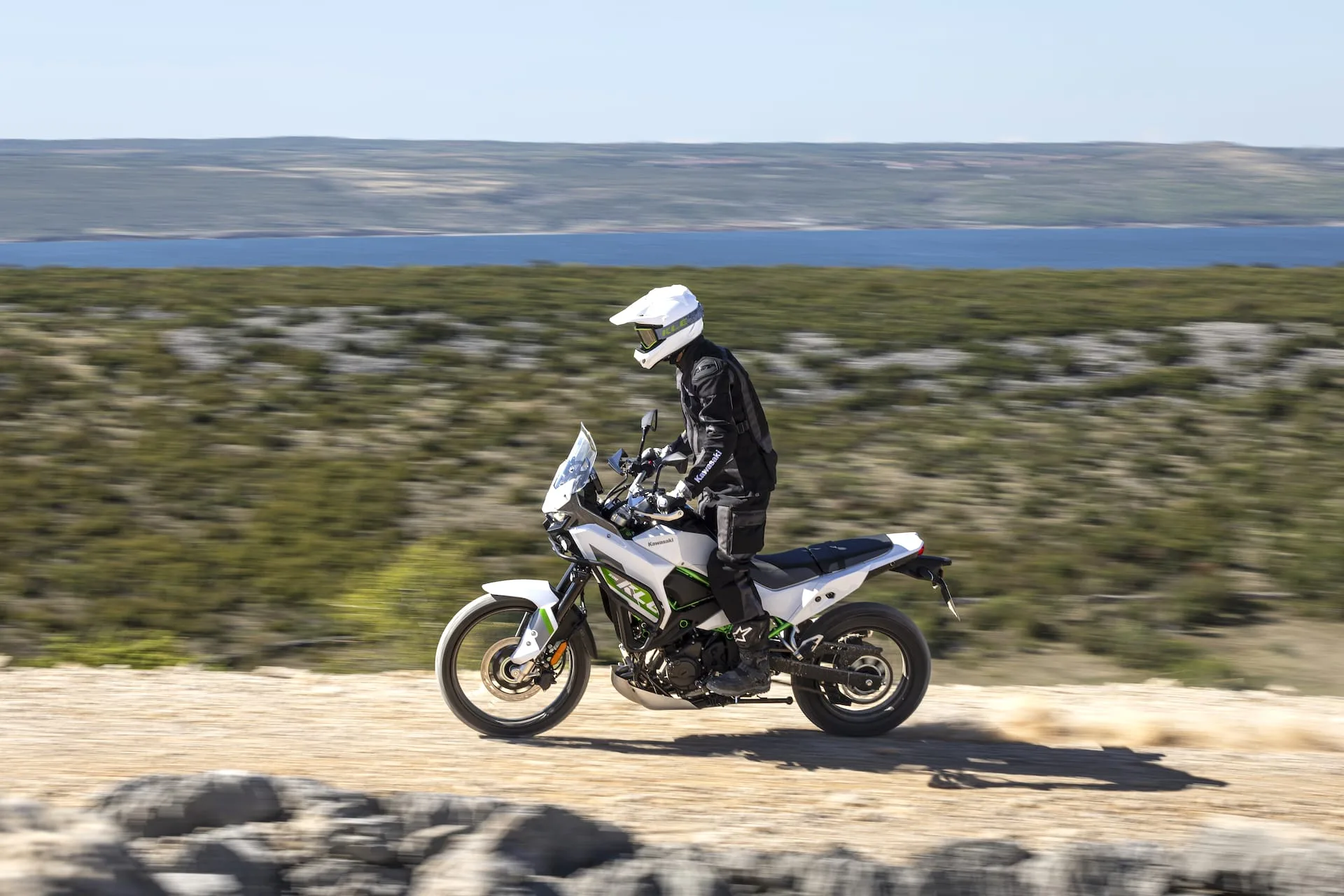 White Kawasaki KLE 500 SE Smartride adventure motorcycle in official studio photography.