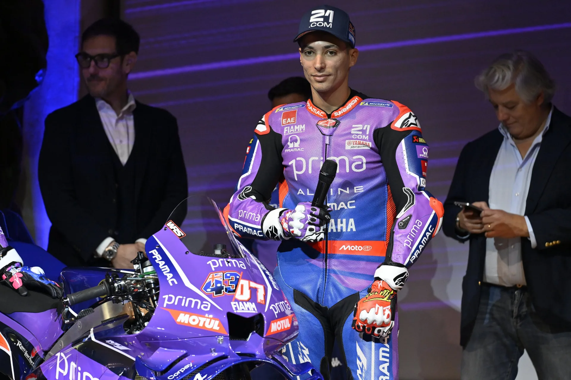 Toprak Razgatlioglu beside the Prima Pramac Yamaha MotoGP machine during the 2026 team presentation