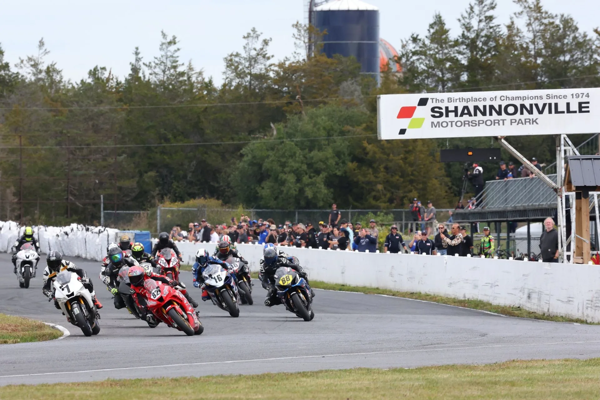 David McKay, Eli Daccache, Francis Martin and Carter Matson enter the first turn during the 2026 RACEMoto Pro Superbike finale at Shannonville.