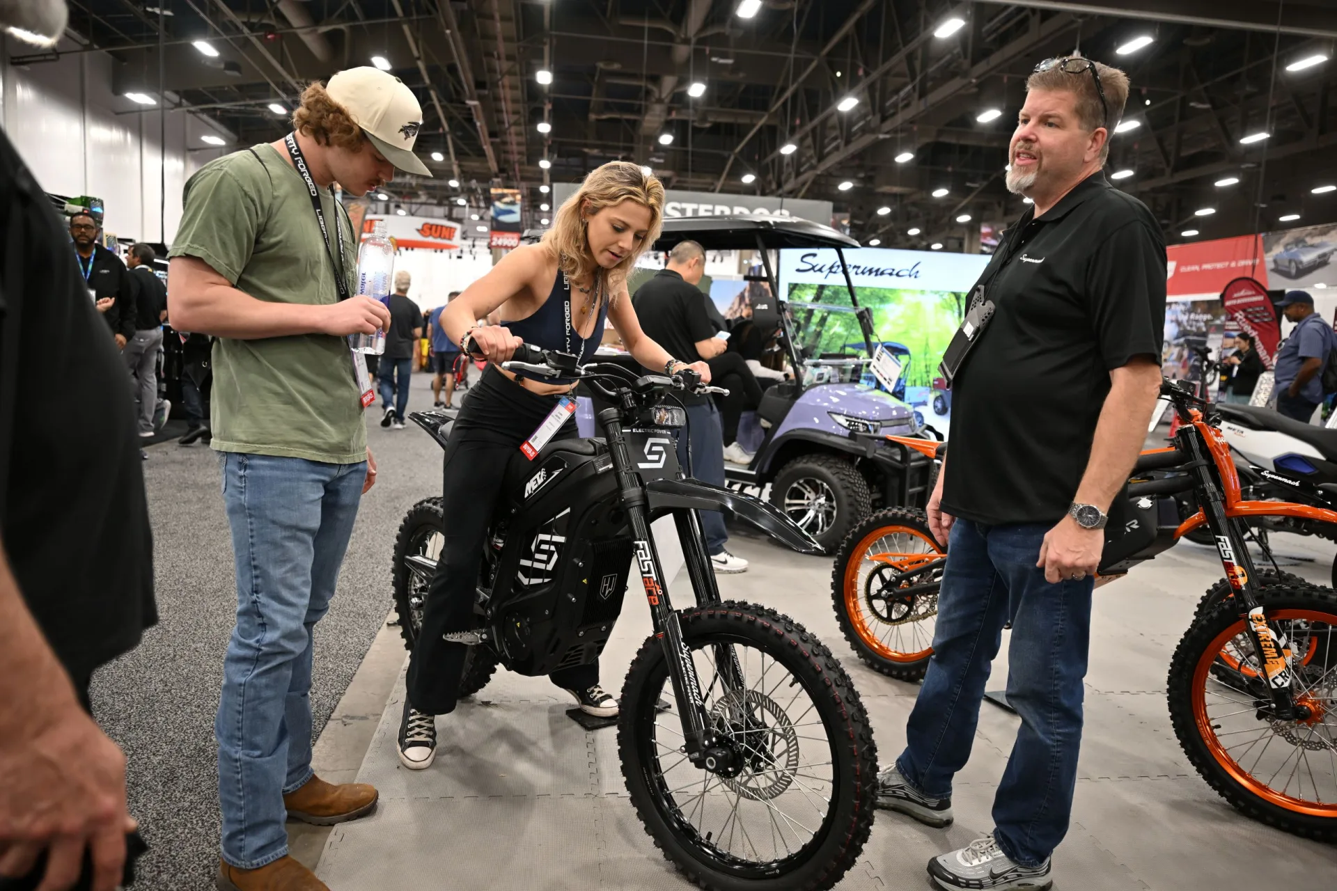 Electric dirt bike display in the SEMA powersports section